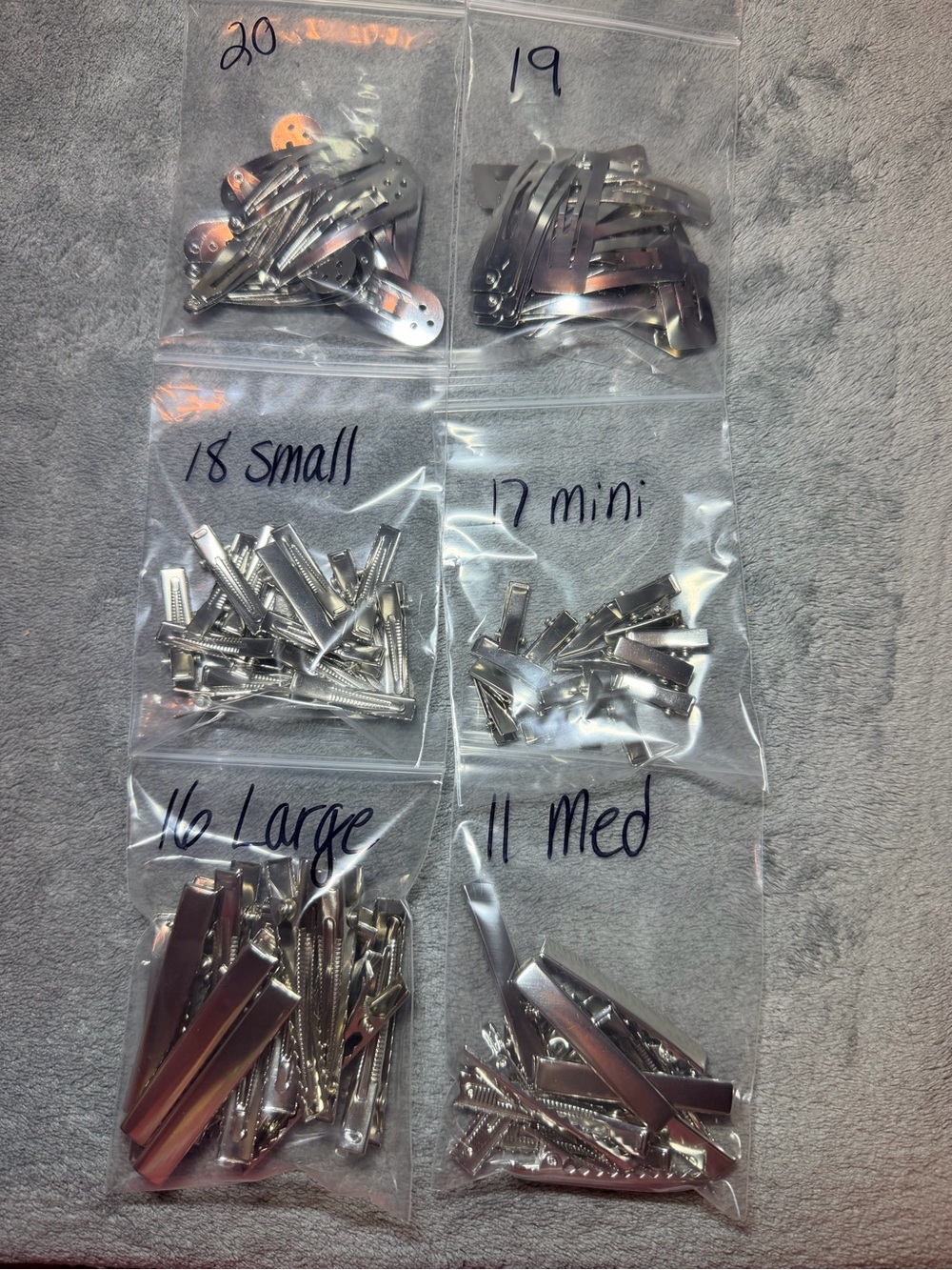 Silver Hair clips. Alligator clips in 4 sizes and 2 styles of snap clips.